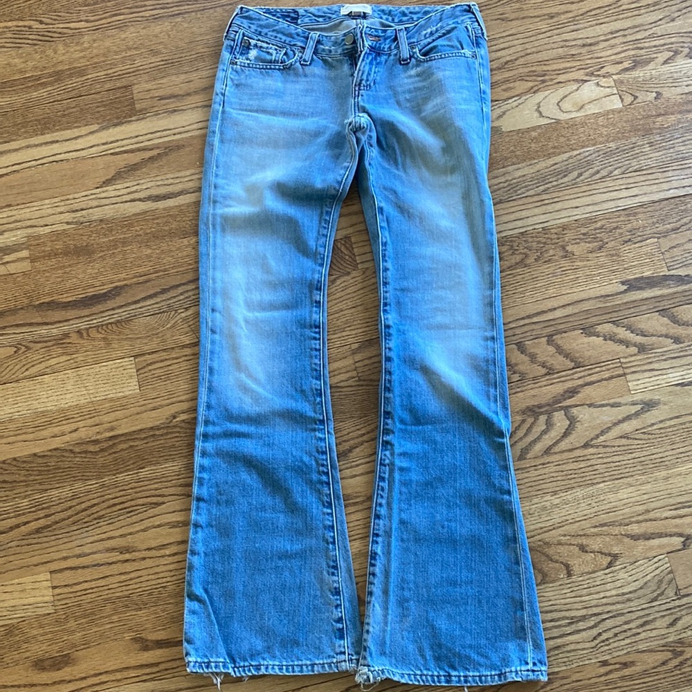 Abercrombie & Fitch size 2Long flared jeans. There is some wear n tear pictured